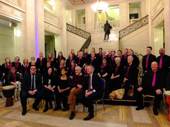 It's a dog's life: Three guide dogs joined the magnificent singers of the Open Arts Community Choir at their 18th birthday celebration in Stormont on Friday. Great for we politicians to have company in the dog house! Pic: Ann & Ken.